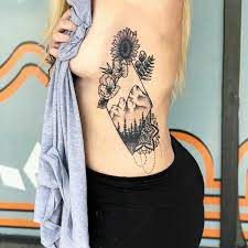 Side rib tattoo female big. 125 Fantastic Rib Tattoo Ideas With Meanings Wild Tattoo Art