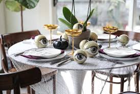 Simplicity is at its best with this super modern take with decorative polka dots. Wicked And Eclectic Halloween Table Setting