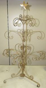 A christmas display with none of the cleanup. Sold Price Wrought Iron Christmas Tree Wire Metal Holder Stand For Holiday Ornament Display 26 1 2 H Ec July 6 0117 4 00 Pm Edt