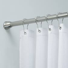 Another thing to consider is whether you want a single or double shower curtain rod. Forma Brushed Stainless Steel Ultra Tension Shower Rod The Container Store