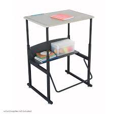 This was designed for younger students with lightweight and clever construction with the unique swinging footrest, bottom shelf, adjustable height, and smooth standard top. Alphabetter Adjustable Height Stand Up Desk 28 X 20 Standard Top And Swinging Footrest Bar Safco Products