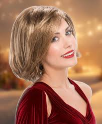 Avery from Tony of Beverly is the epitome of chic sophistication, featuring  mid-length layers that gracefully cascade from the shoulders. With its  sleek silhouette and dimensional side-swept bangs, Avery offers a versatile