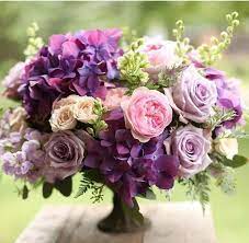 Purple And Pink Centerpiece By Floral Verde Pink Wedding Centerpieces Pink Flower Arrangements Purple Wedding Centerpieces