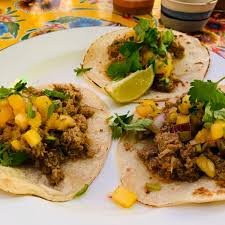 Perfectly crispy panko coated cod and spicy slaw piled into a corn. Lopez Y Lopez Taco Place In Hermanni