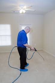 Carpet Steam Cleaning Man Treating Stains In Carpet With Commercial Cleaning Eq Ad Cleaning M How To Clean Carpet Diy Carpet Cleaner Steam Clean Carpet