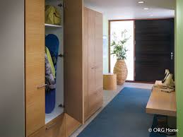 The top tier features three metal hooks for holding jackets and book bags while the bottom two cubbies are ideal for organizing shoes, toys, games, and more. Columbus Mudroom Entryway Storage Systems Innovate Home Org