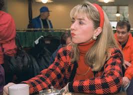 Splashing the water with her feet while attending college. Hillary Clinton Hair Attacks From The Headband To The Wig