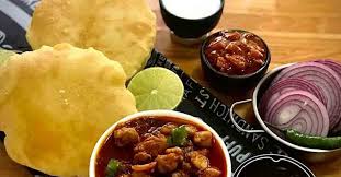 Chole bhature needs no introduction. Classic Chole Bhature Onmanorama Food