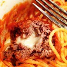 Yummy Mozzarella Stuffed Meatballs Thank You Giada De Laurentiis Mozzarella Stuffed Meatballs Food Recipes
