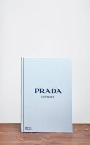 Coffee table books are an authentic form of education and a fine way to spend some of your abundant free time. Prada Catwalk Coffee Table Book Home Prettylittlething Il