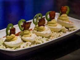 Deviled Eggs With Jalapeno And Candied Bacon At Firebirds Tailgate Food Food Savory Snacks