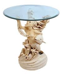 Spi surfacing dolphin end table 34902. I Love Mermaids This Is Actually A Water Fountain And A End Table It S One Of My Favorite Pieces Mermaid Diy End Tables Mermaid Theme