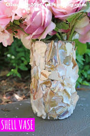 You'll need a specialized glue made to bond with glass, or the glass will come apart again as soon as it is cleaned. How To Make A Seashell Covered Vase Craft Tutorial For Your Home