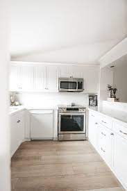 Pros And Cons Of Marble Counter Tops Me And Mr Jones Marble Countertops Kitchen White Marble Kitchen Wood Floor Kitchen