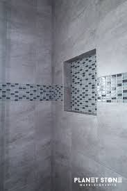 We Love This Mosaic Tile In This Shower The Light Blue Hues Really Compliment The Gray Ceramic Tile Shower Tile Bathroom Shower Walls Mosaic Shower Tile