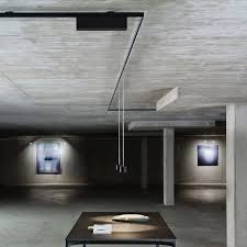 The black frames of the tracks consistently transfer the. Low Voltage Track Light System Ceiling Buschfeld Design 12v