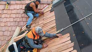Position the first shingle so its end overhangs the edge of the roof by 1 1/4 to 1 1/2 inches. Installing Cedar Shakes Fine Homebuilding