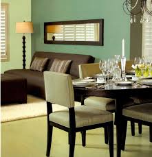 In the dining room, a deep plum burnished venetian plaster was put on the walls above the existing white wainscot. Home Decoration Dining Room Paint Ideas 2 Colors
