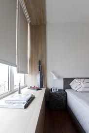 If your bay window is off of a living or dining room, it's a great place to house a bar cart and club chair! Natura Loft Apartment By Ao Studios