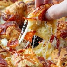 If you do have leftovers, transfer them to an airtight container or wrap them with foil and refrigerate for up to 3 days. Pizza Monkey Bread Tornadough Alli