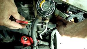It is a square black sensor that snaps into the radiator and held with a clip. Radiator Coolant Level Sensor Replacement Youtube