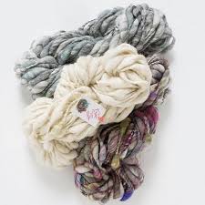 This yarn is 100% wool with 2 skinny strands of sparkly lurex plied around it in a subtle thick and thin texture. Knit Collage Pixie Dust Atelier Yarns