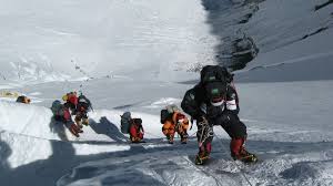 Before the body's recent removal, green boot's body rested near a cave that all climbers must pass on their way to the peak. Melting Everest Glaciers Throw Up Climbers Bodies The Weather Channel Articles From The Weather Channel Weather Com