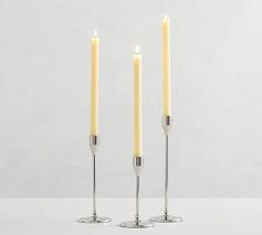 Create a glowing ambience and set the mood with unique candle holders. Modern Silver Taper Candleholders Set Of 3 Pottery Barn