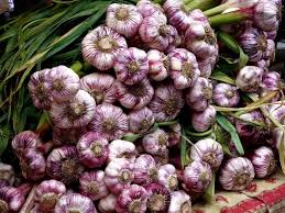 Select two pieces of potato with eyes on each side (indentations where roots emerge) to regrow. How To Grow Garlic From A Clove