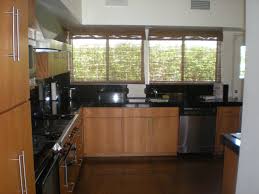Over the sink dish drying rack large dish drainer, kitchen supplies shelf with utensil holder and 5 hooks, sturdy. St Charles Steel Kitchen Cabinets Are Restored To Frank Sinatra S Palm Springs Home Twin Palms
