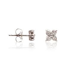 Boucles d'oreilles fleur en or jaune 14k combiné à une finition mate en or blanc. Boucles Oreilles Or 375 Fleurs De Diamants 0 09 Ct Mes Bijoux Fr