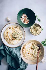 Spaghetti With Toasted Almond And Green Olive Pesto Hello Veggie Recipe Food Olive Pesto Vegetarian Recipes Lunch