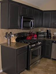 Antique Distressed Black Cabinets Home Interiors Black Kitchen Cabinets Kitchen Design Kitchen Cabinet Inspiration