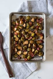 Cut brussels sprouts in half, lengthwise. Roasted Brussels Sprouts With Bacon And Balsamic Kitchen Joy