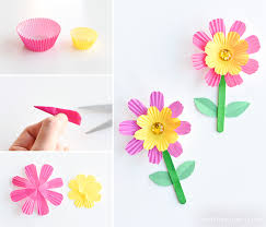 But mother's day doesn't have to mean the same old cards or flowers that will only last a couple of days. Simple Cupcake Liner Flowers Tutorial One Little Project