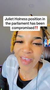 Juliet Holness Hug Delano