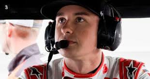 NASCAR Cup Series driver Christopher Bell (20) sits in his pit box Saturday, July 25, 2026, during qualifying for the Brickyard