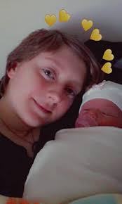 Grandmother babysitting her granddoll Twila