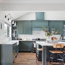 Green and yellow paint colors feel happy and harmonious. This Green Hue Will Be A Hot Kitchen Color Trend In 2020