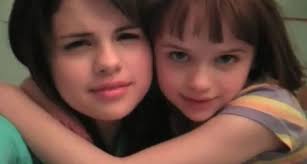 Selena Gomez Holding Big Screen Baby Sister Popdirt Com