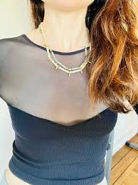 Speckled Rhodonite Gray, Black, and Pink, White Cylinder Beaded Necklace  Antiqued Bronze Dagger Bib With Gold Toggle