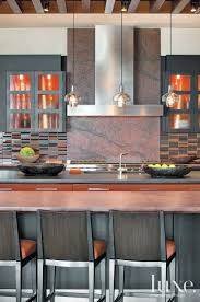 modern red kitchen with brushed granite