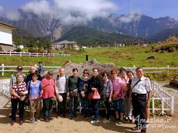 Often chosen as a wedding photography destination, with the majestic mount kinabalu overlooking beautiful green pastures, the scenery is breathtaking. Kinabalu Park With Rumah Terbalik Desa Cow Farm Amazing Borneo Tours Amazing Borneo Tours