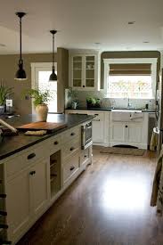 White oak kitchen cabinets with black countertops. Cream Colored Kitchens Suits Redboth Com Country Kitchen Cabinets New Kitchen Cabinets Maple Kitchen Cabinets