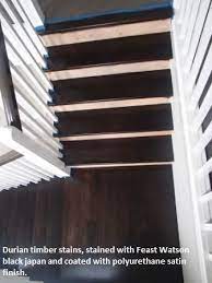 These Floating Timber Stairs In Ashgrove Are In The Process Of Being Completed The Timber In This Staircase Black Wood Floors Stained Staircase Timber Stair