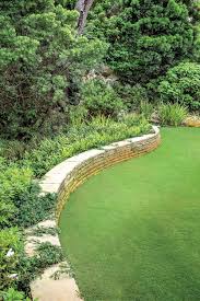 Tropical Garden In Coral Gables Tropical Garden Garden Design London Natural Stone Retaining Wall