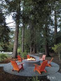 Adirondack chair patio chairs folding adirondack chair lawn chair outdoor chairs set of 2 fire pit chairs patio seatingwood chairs for adults yard garden w/natural finish $160.99 ($80.50/count) Bring Back Summer Camp Memories With These Elegant Orange Adirondack Chairs Set Around This Fire Pi Outdoor Fire Pit Designs Backyard Fire Fire Pit Landscaping
