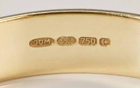Gold plated jewelry markings some other markings mean a jewelry item is not fine karat gold. Gold Hallmarks World Gold Council