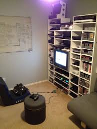 Video Game Console Wall Game Room Shelves Via Reddit User Franchy36 Look At All Those Gaming System Video Game Organization Game Room Decor Video Game Rooms