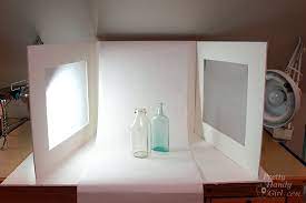 Make Your Own Light Studio Using Tracing Paper Foam Board And A Roll Of White Paper Easily Folds Photography Lighting Diy Diy Photo Studio Light Photography